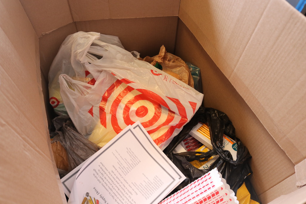 Huge box of school supplies.