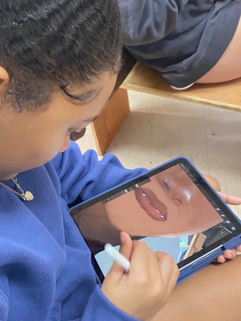 Art I students are drawing digital self-portraits.