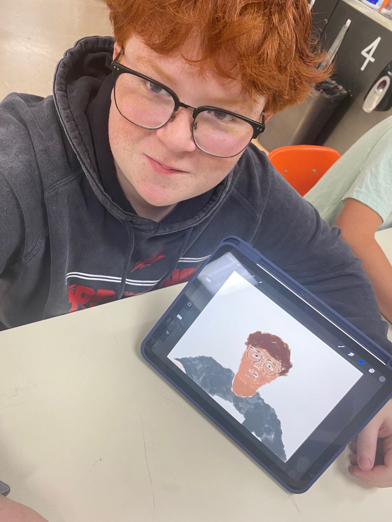 Art I students are drawing digital self-portraits.