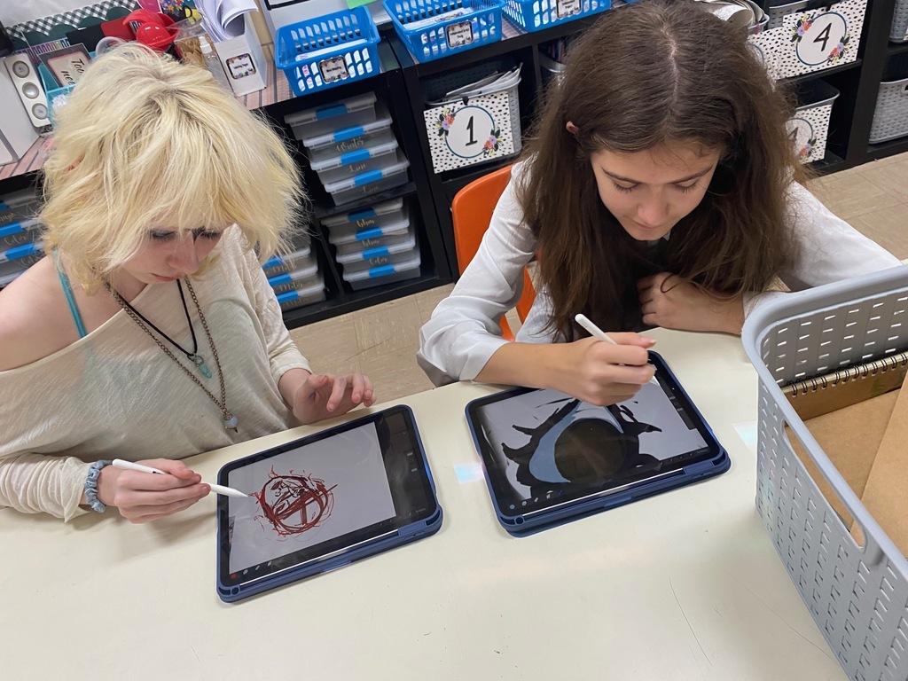 Art I students are drawing digital self-portraits.