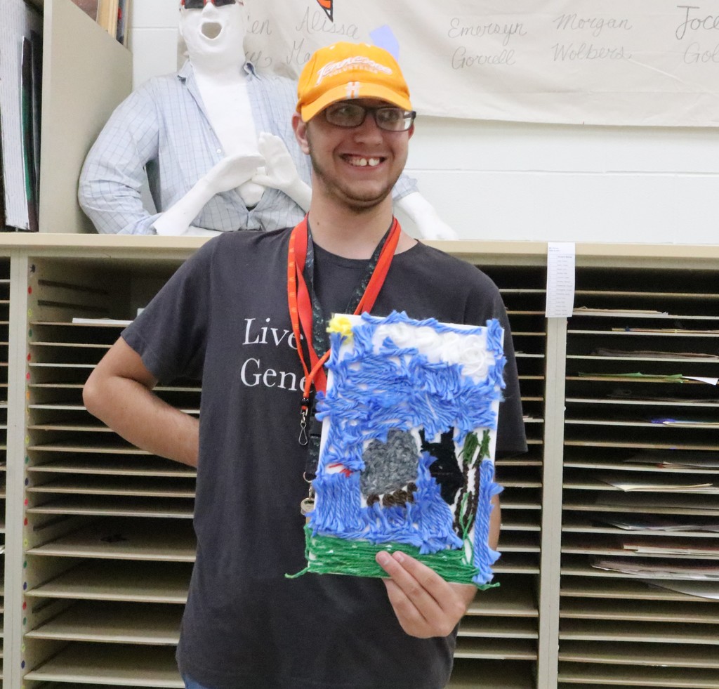 THS student with his art project.