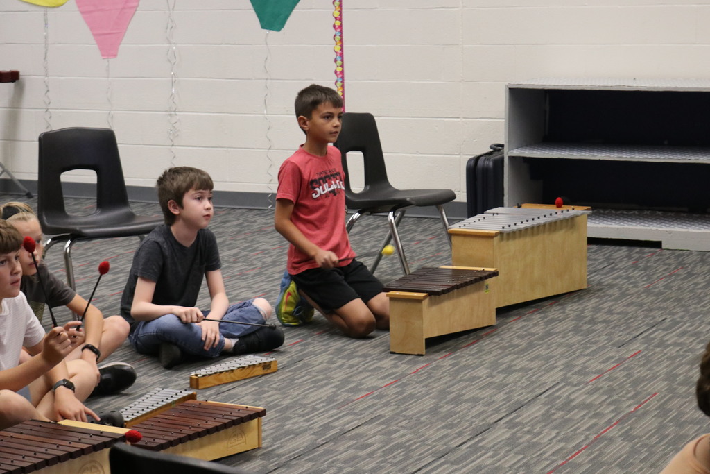 Students in 5th grade music class are learning about rhythm. 