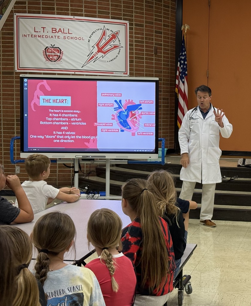 Students learn about the heart from a cardiologist.  