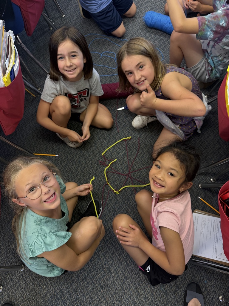 Students creating web catchers.