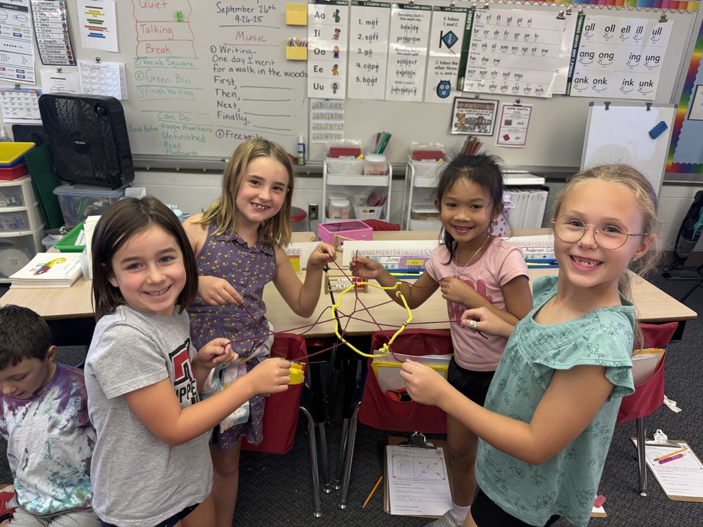 Students creating web catchers.