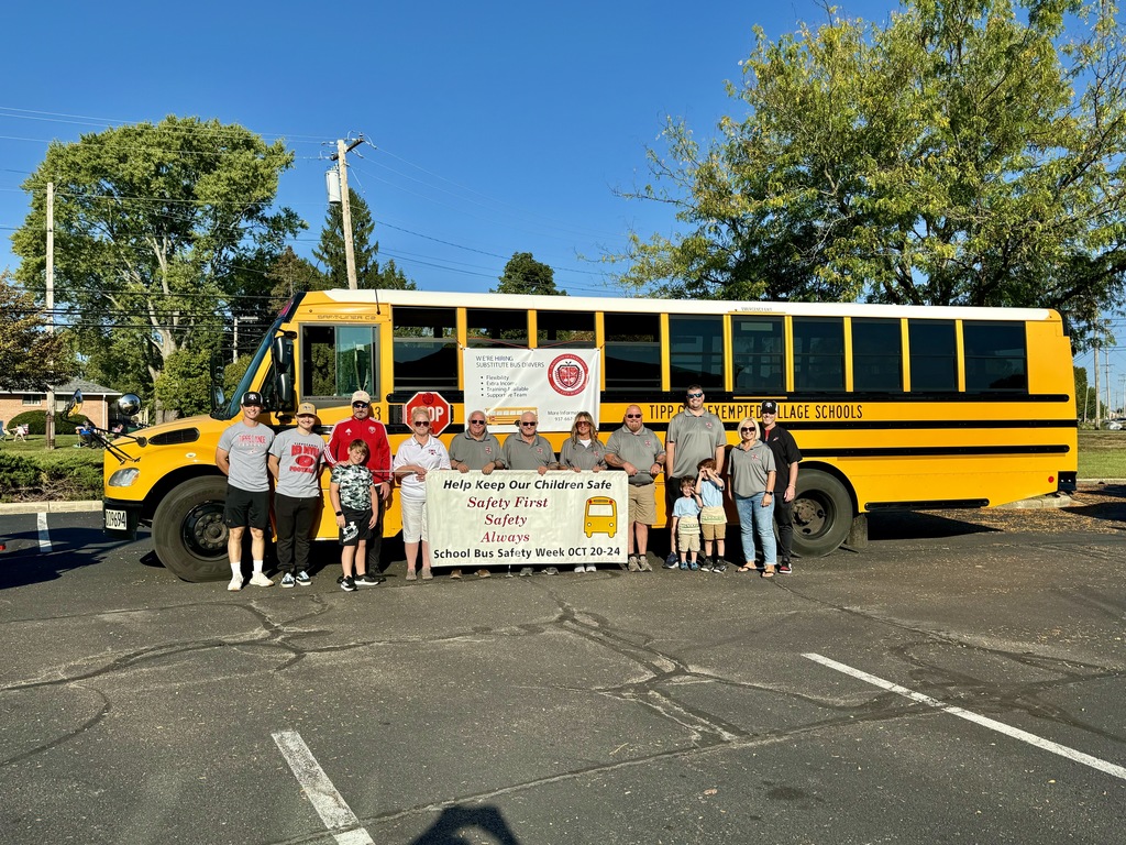 Transportation Department poses before the Mum Festival parade.