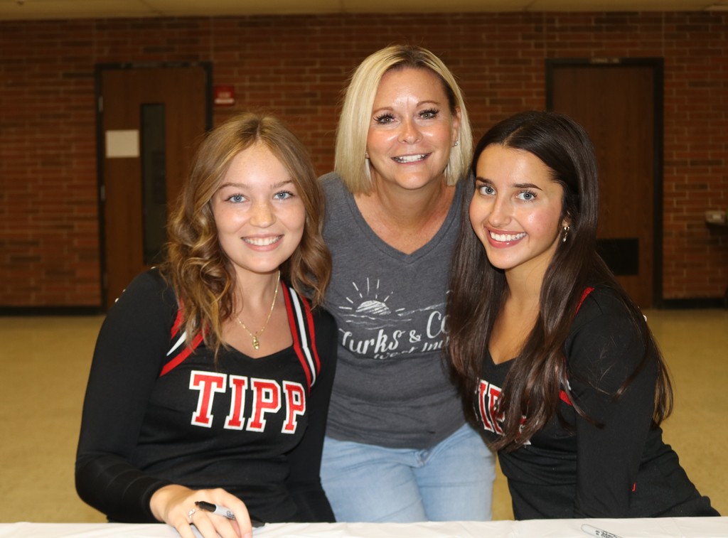 Mrs. Hake with two THS seniors who were once her kindergarten students.