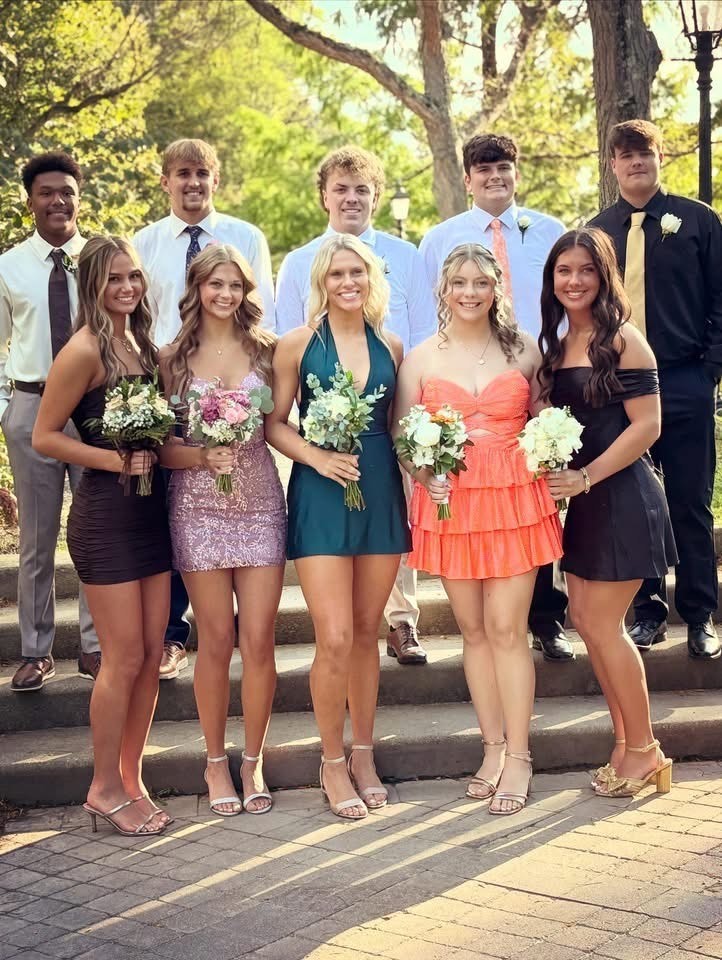Students pose for 2025 Homecoming Dance pictures.