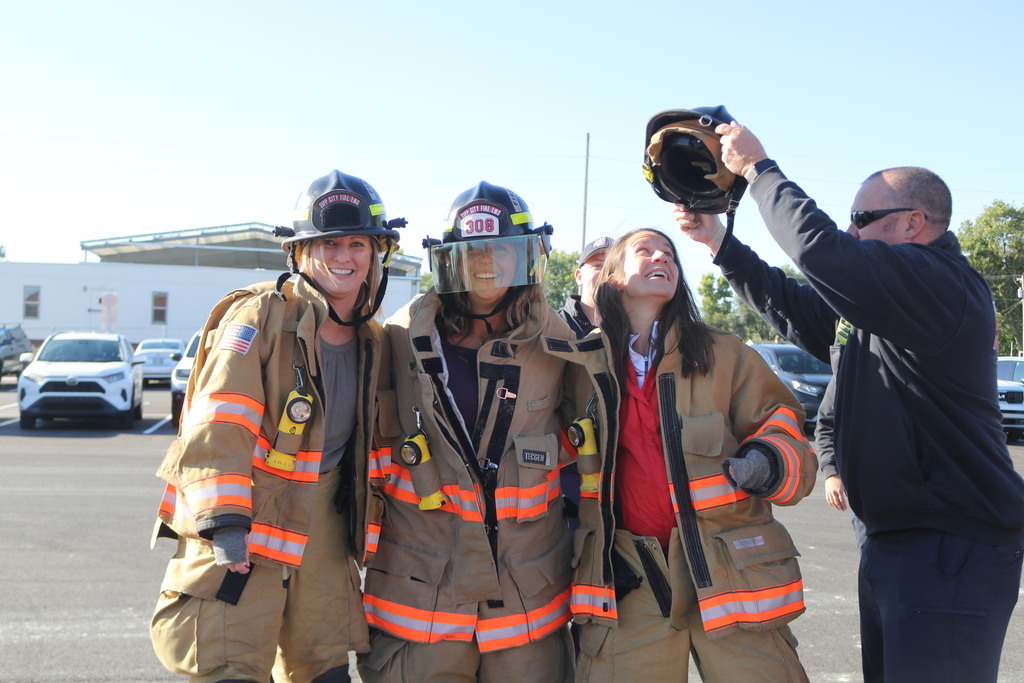 Teachers raced to put on firefighting gear.  