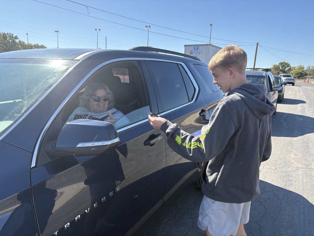 Teen Empowerment crew hands out pup cups.