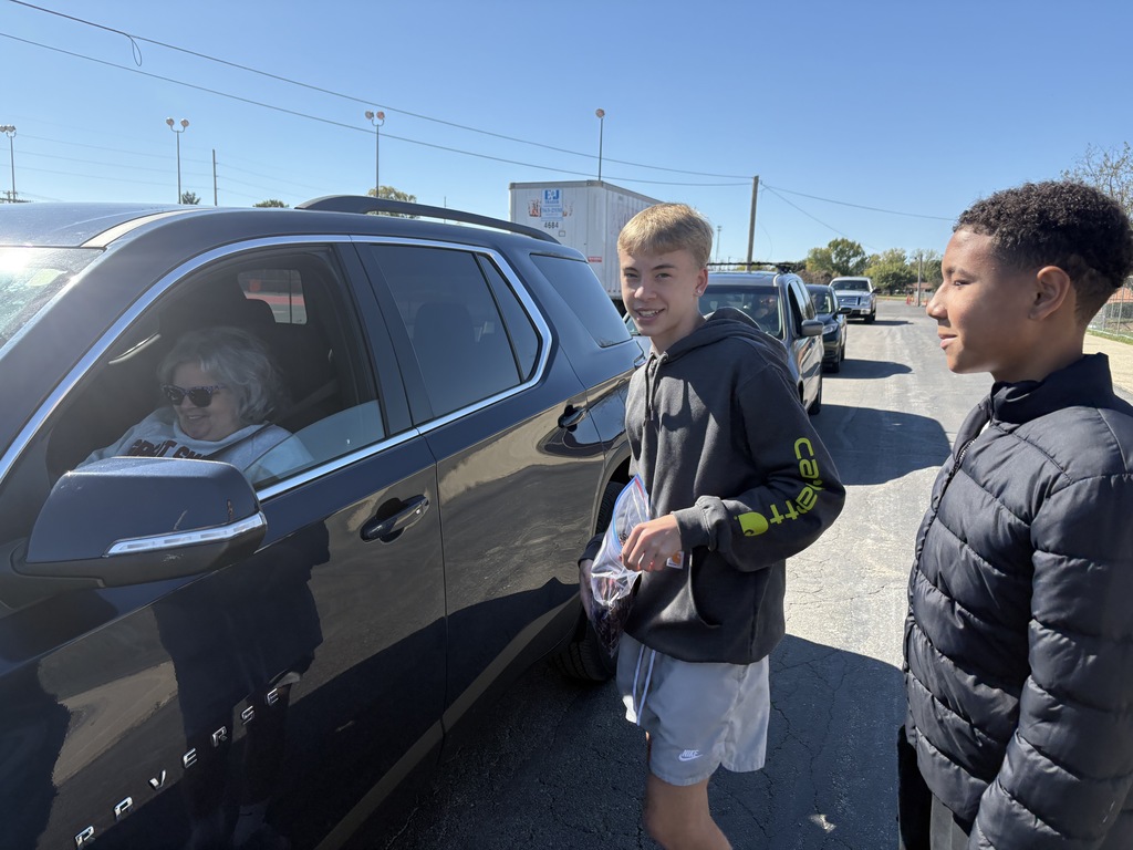 Teen Empowerment crew hands out pup cups.