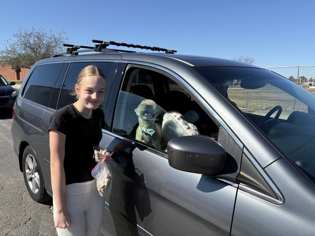 Teen Empowerment crew hands out pup cups.