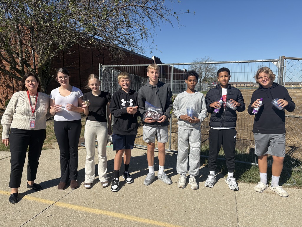Teen Empowerment crew hands out pup cups.