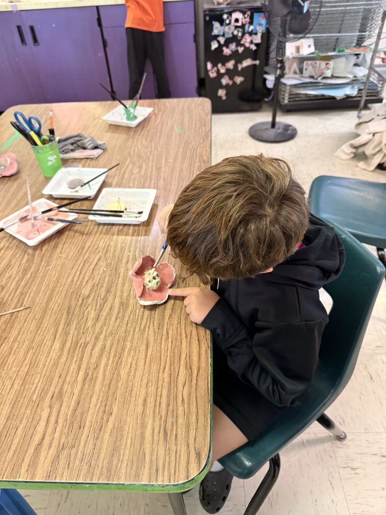 L.T. Ball students work on poppies in art class.  