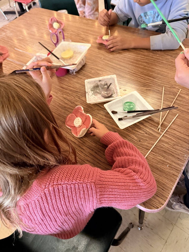 L.T. Ball students work on poppies in art class.  