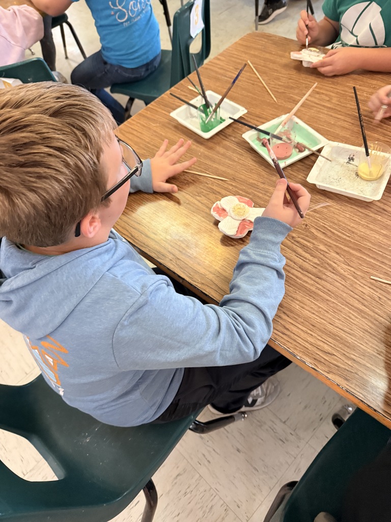 L.T. Ball students work on poppies in art class.  