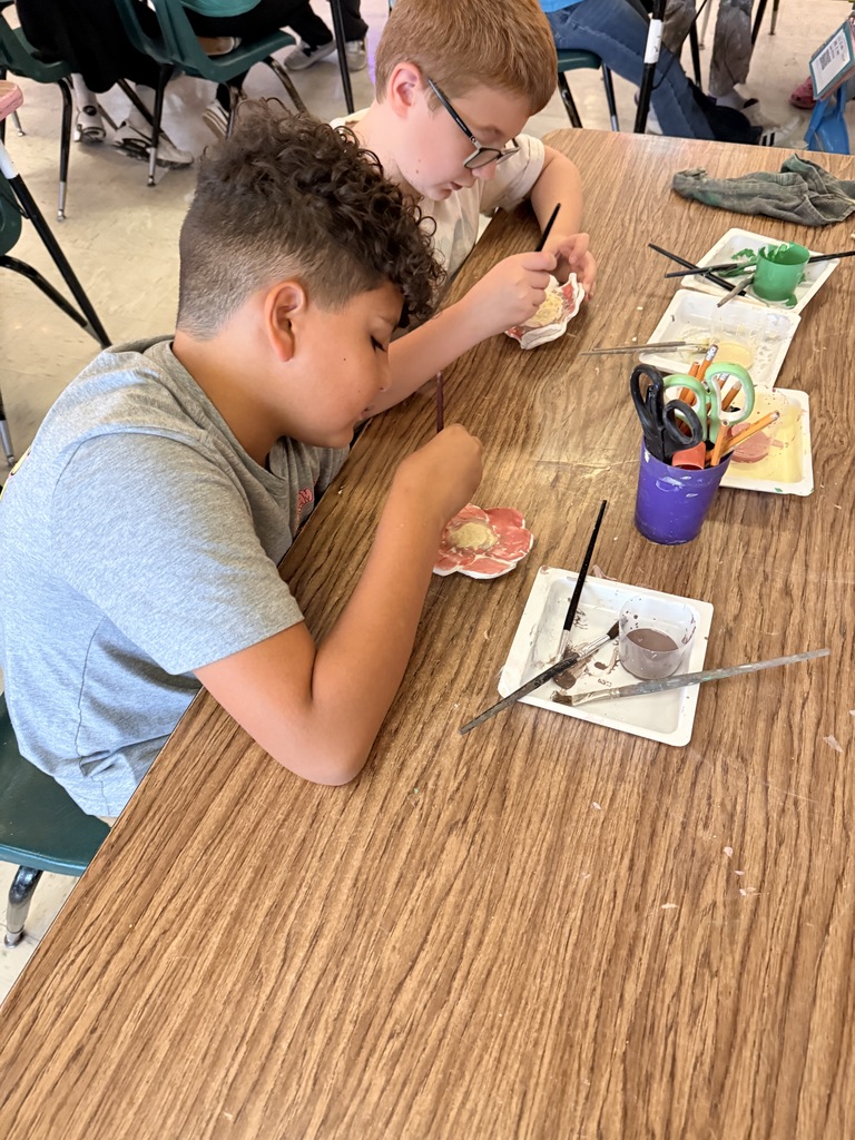 L.T. Ball students work on poppies in art class.  