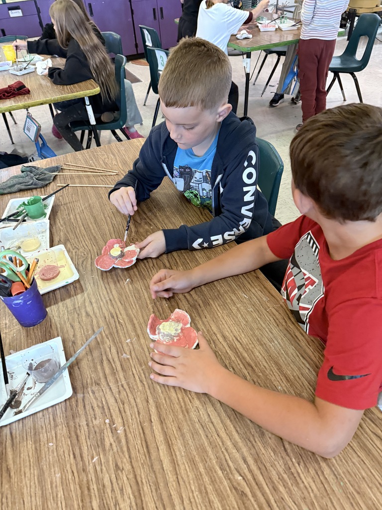 L.T. Ball students work on poppies in art class.  