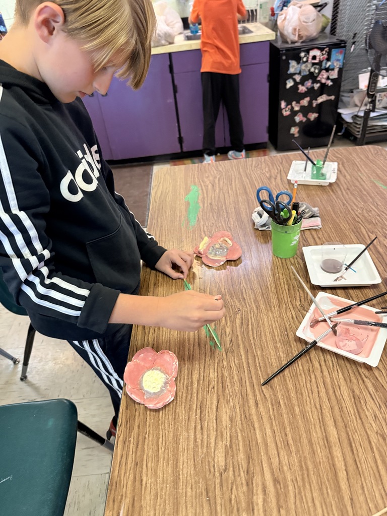L.T. Ball students work on poppies in art class.  