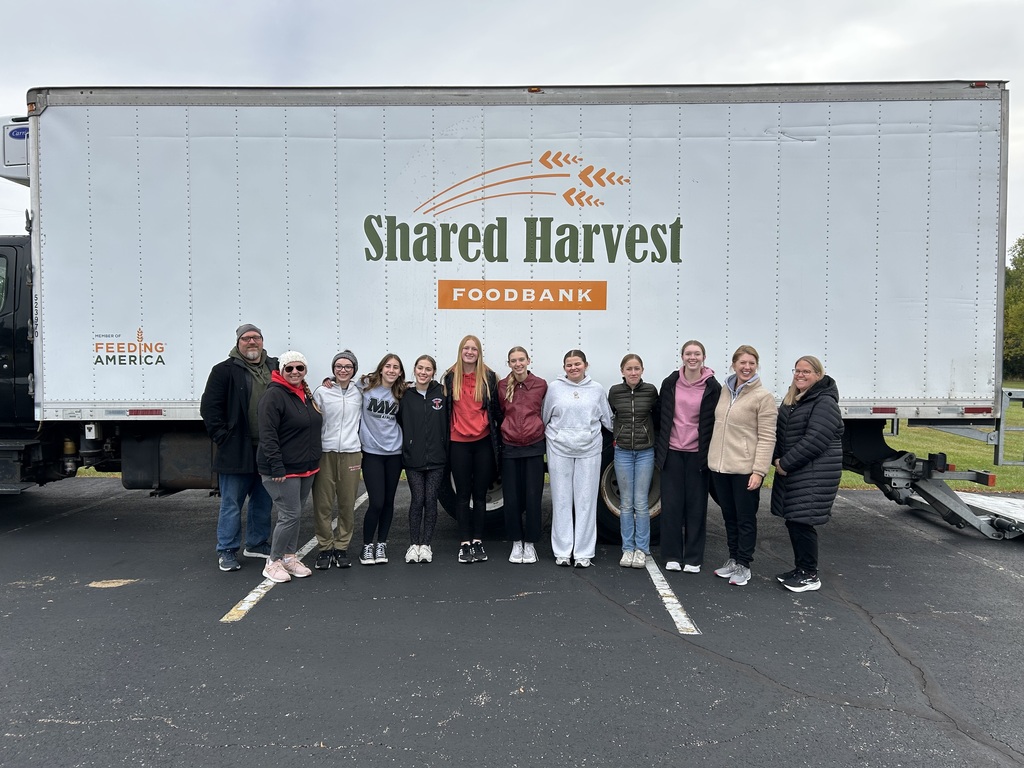 TMS volleyball players and parents volunteer at Shared Harvest.