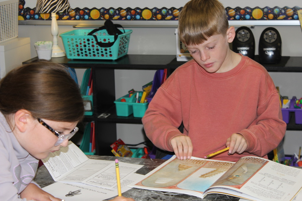 Third graders at the outer space Book Tasting. 