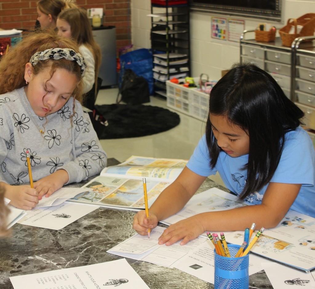 Third graders at the outer space Book Tasting.  