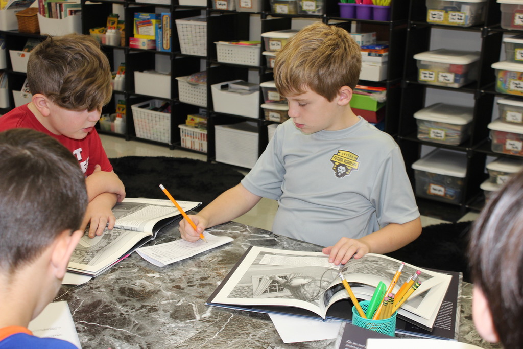 Third graders at the outer space Book Tasting. 