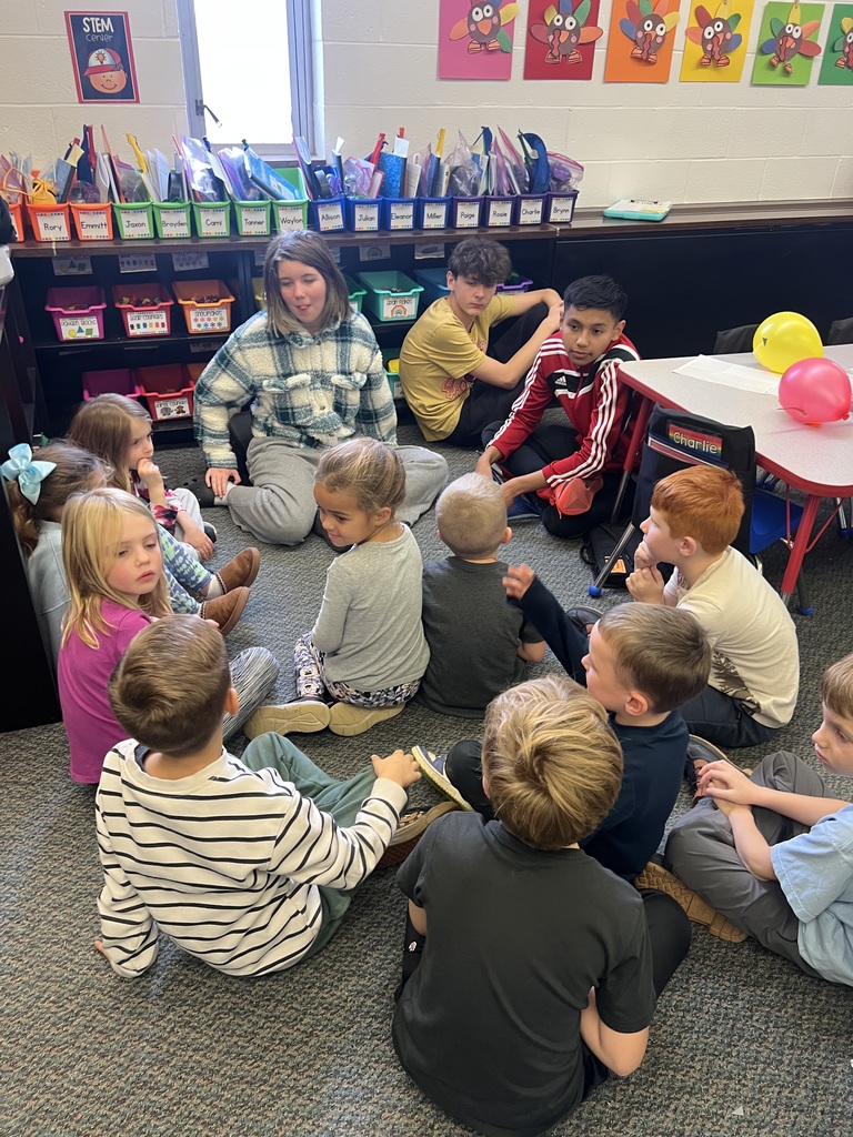 TMS 8th graders work with kindergarten students to learn about holiday traditions around the world. 