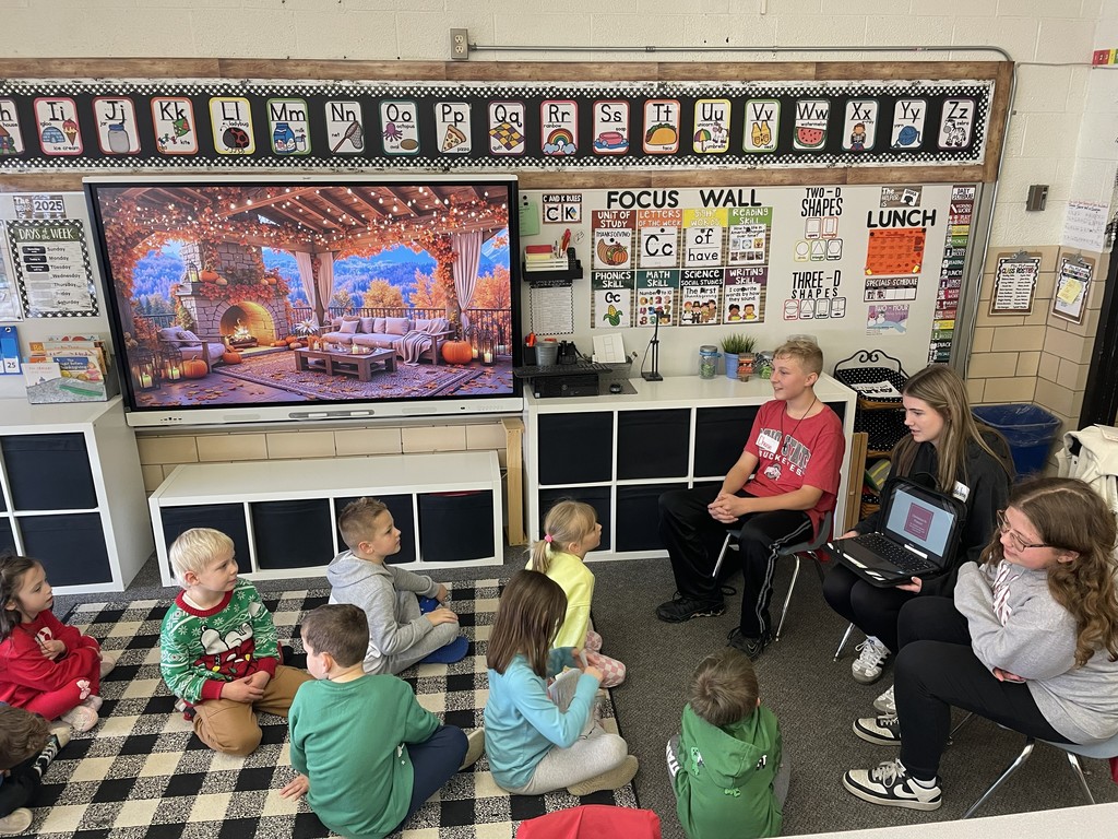 TMS 8th graders work with kindergarten students to learn about holiday traditions around the world. 