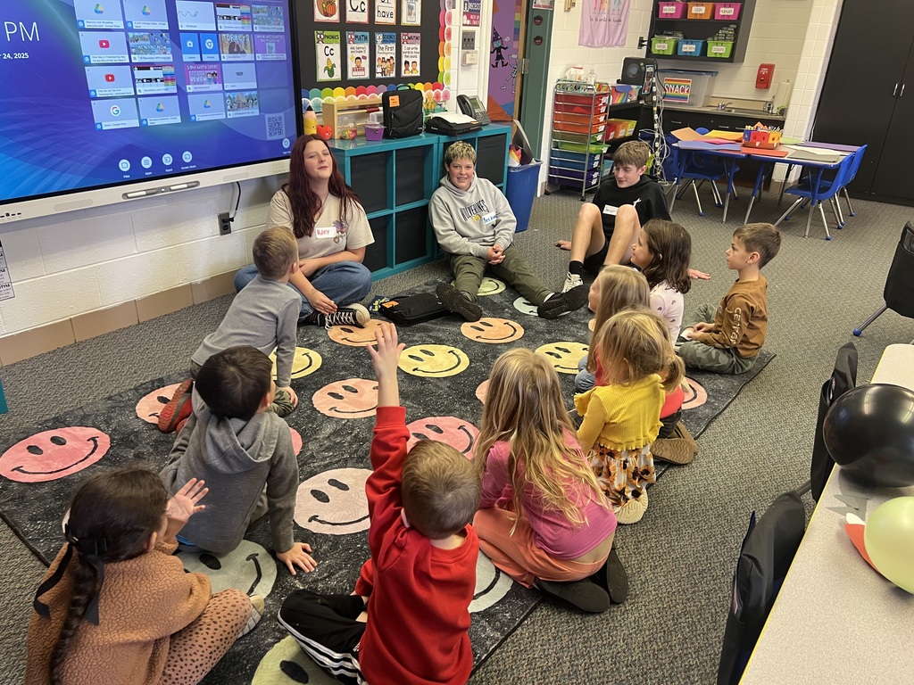 TMS 8th graders work with kindergarten students to learn about holiday traditions around the world. 