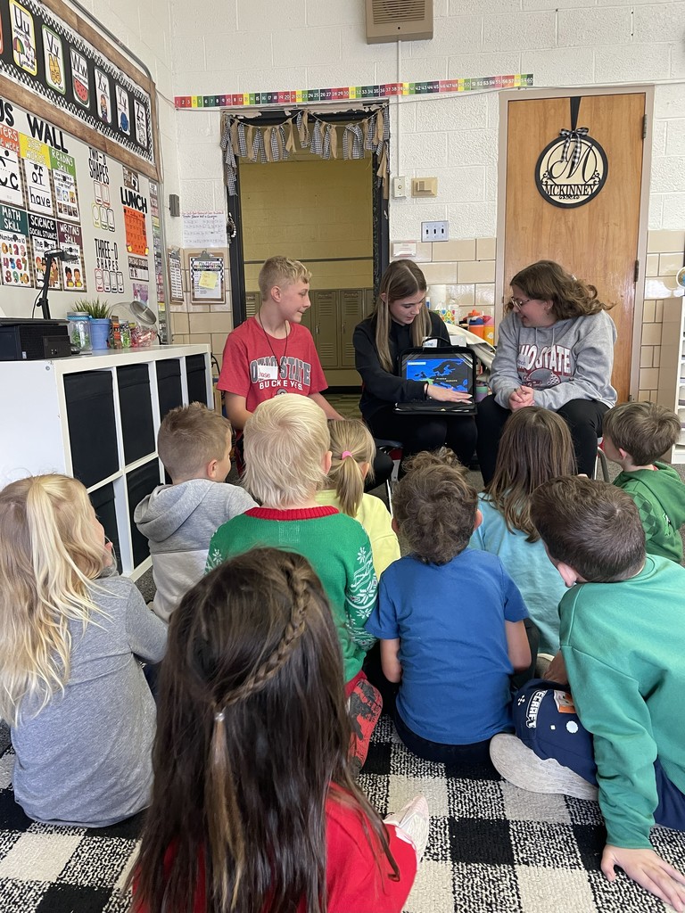 TMS 8th graders work with kindergarten students to learn about holiday traditions around the world. 