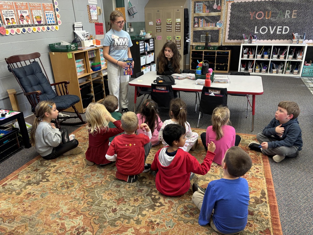 TMS 8th graders work with kindergarten students to learn about holiday traditions around the world. 