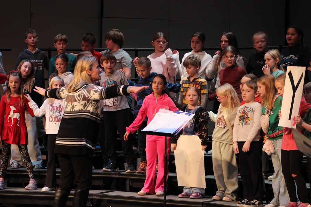 L.T. Ball third graders rehearse their music program at the Center for Performing Arts.  