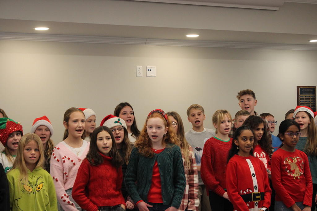 L.T. Ball 5th graders sing some holiday music for members of the Tipp Senior Center.  