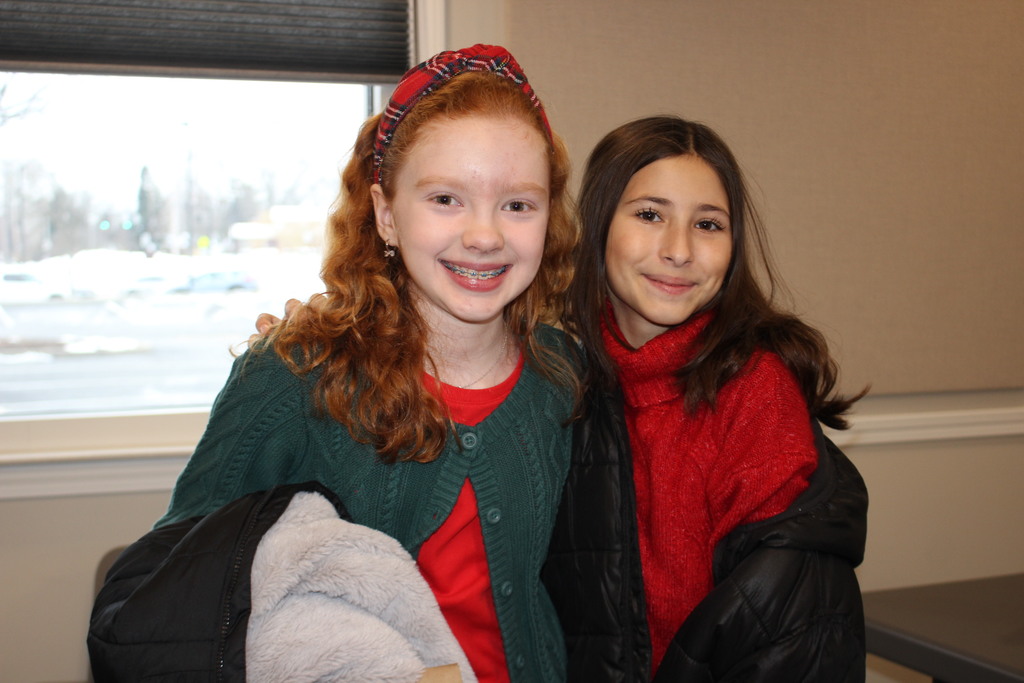 L.T. Ball 5th graders sand some holiday music for members of the Tipp Senior Center and get ready to head back to school.  