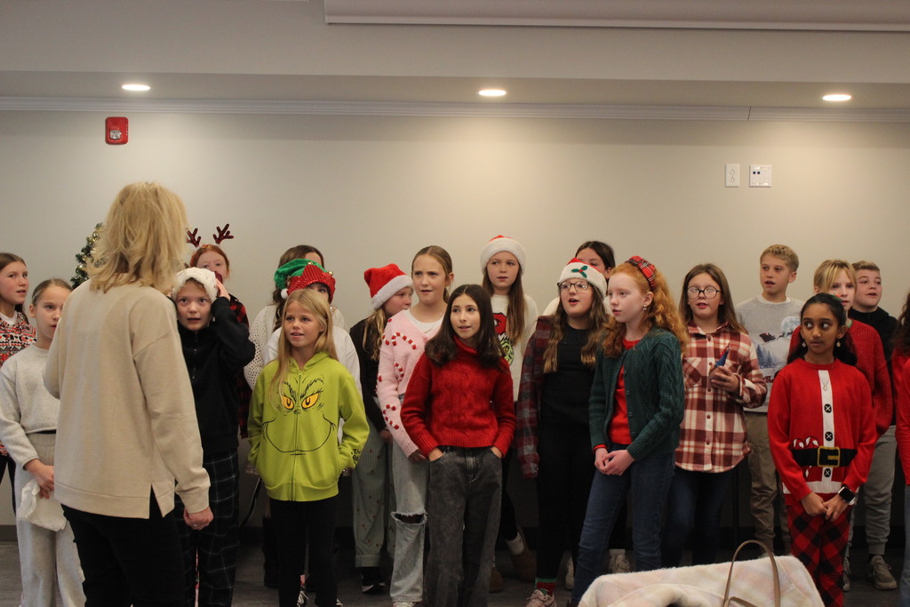 L.T. Ball 5th graders sing some holiday music for members of the Tipp Senior Center.  