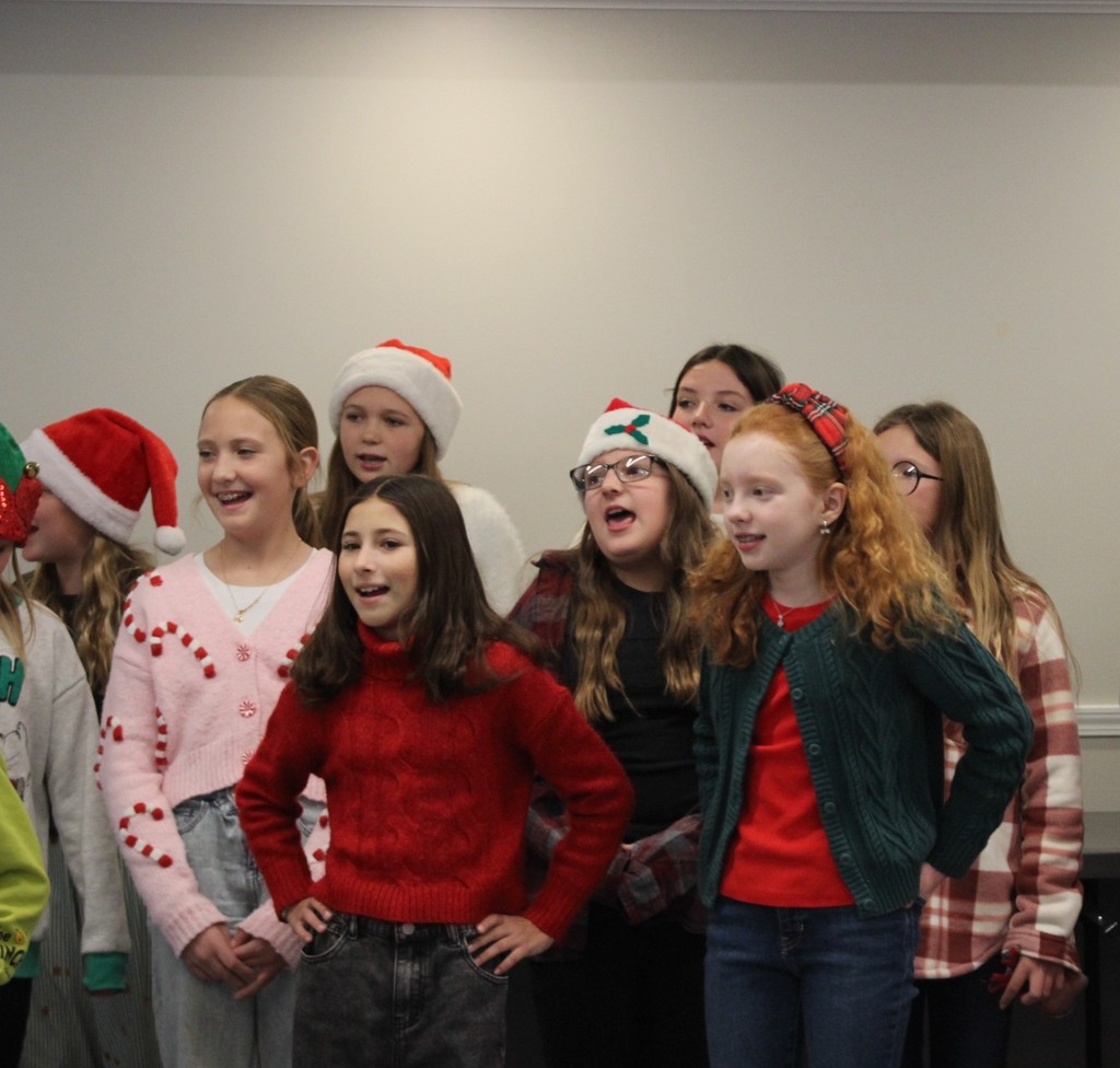 L.T. Ball 5th graders sing some holiday music for members of the Tipp Senior Center.  
