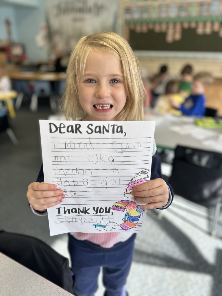 Kindergarten students wrote letters to Santa and mailed them to the North Pole.