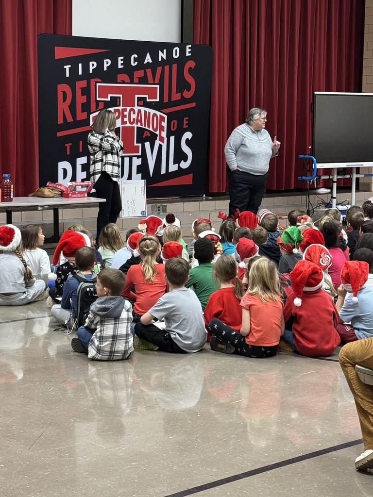 Kindergarten students wrote letters to Santa and mailed them to the North Pole.