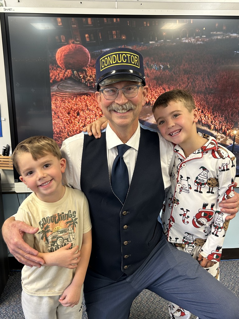 Mr. G the conductor from Polar Express deliver hot chocolate to kindergarten students.