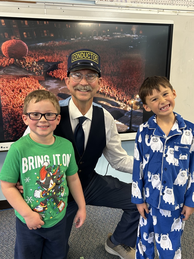 Mr. G the conductor from Polar Express deliver hot chocolate to kindergarten students.