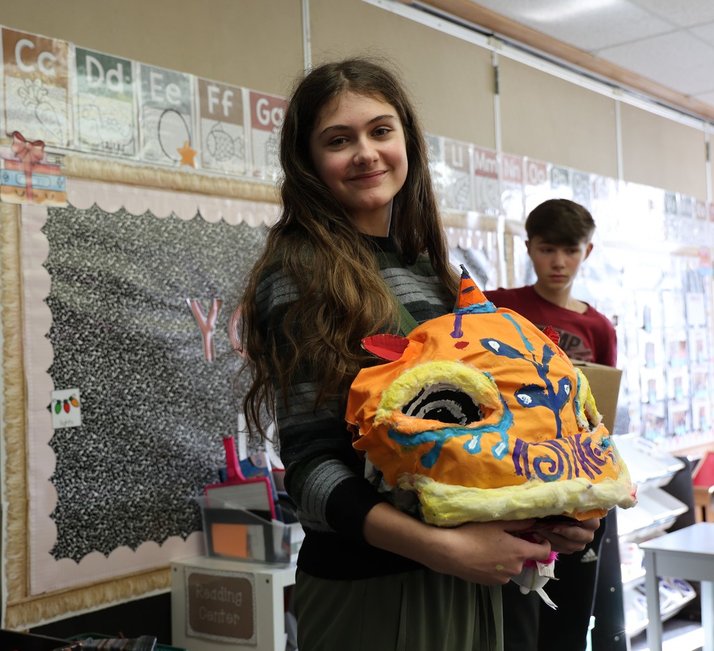 TMS Designing Thinking students show off their project.  