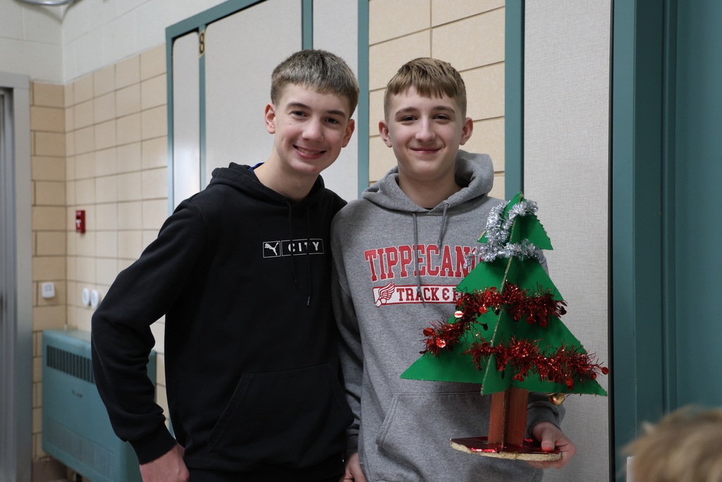 TMS Designing Thinking students show off their project.  