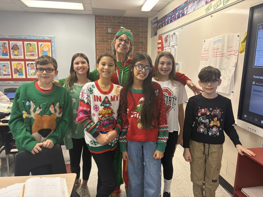Ugly Sweater Day at L.T. Ball. Students and staff are dressed up.