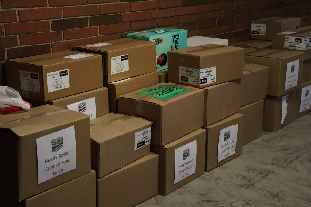 Boxes of food for Needy Basket.