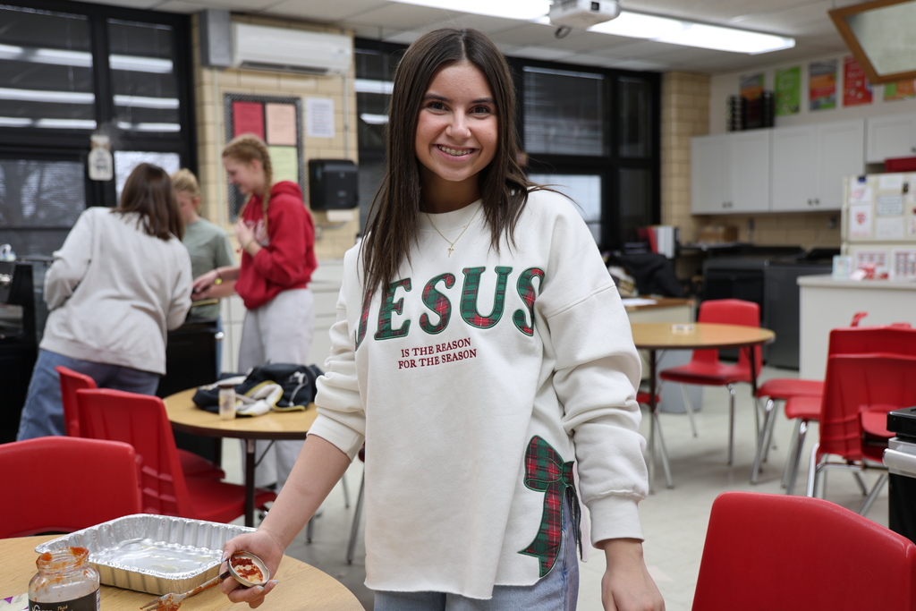 TMS students preparing lasagna for St. Vincent de Paul.