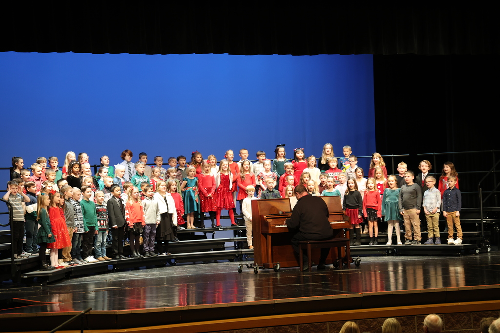 Broadway Elementary students show their holiday spirit at their concert.