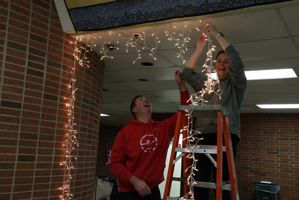 Hanging lights and decor for the upcoming Blizzard Blast.