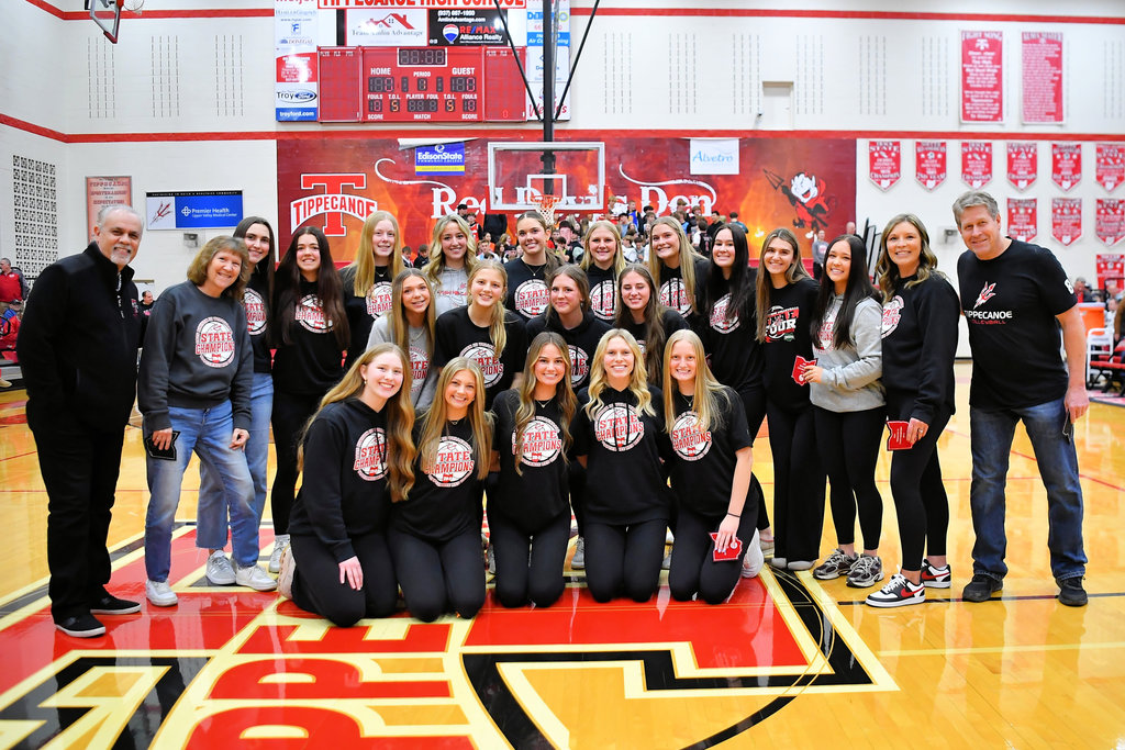 THS volleyball team and coaches after being honored at a home basketball game.