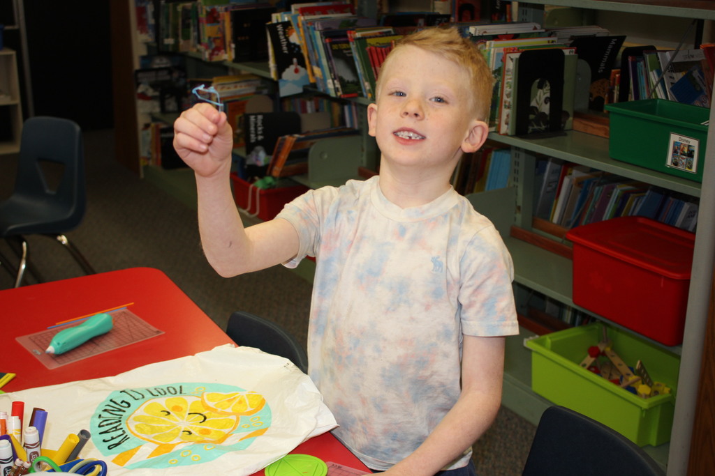 A Broadway student works with a 3D Pen.  